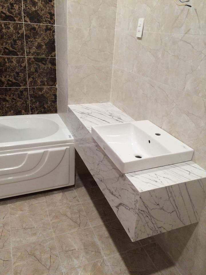 Trắng vân mạch thi công bàn lavabo